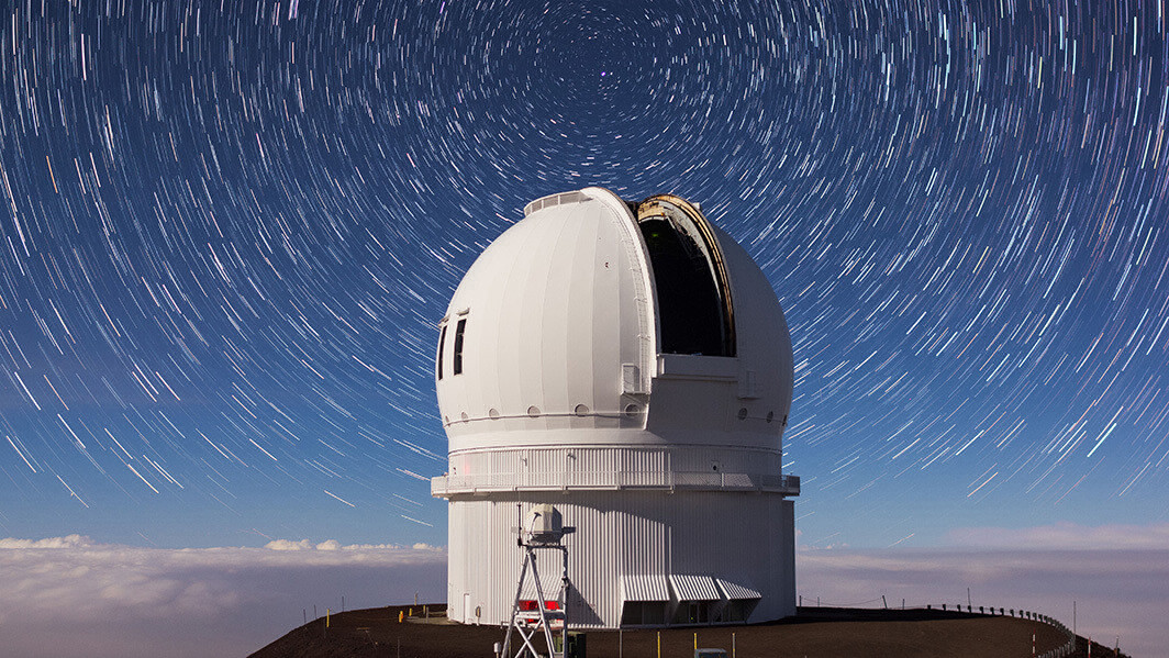 Star trails over the Canada-France-Hawai’i Telescope on the summit of Maunakea. 
