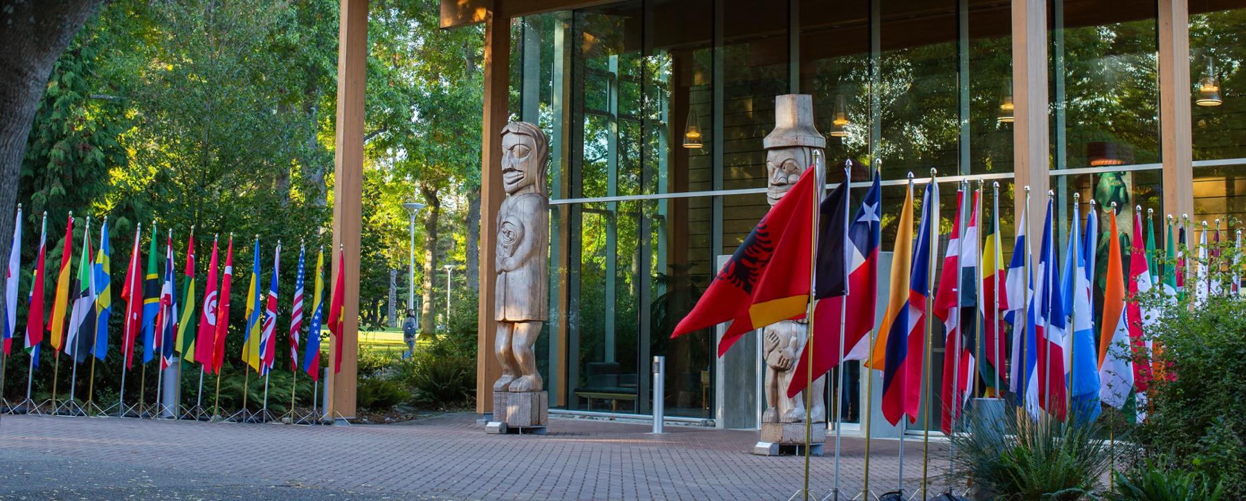 country flags displayed in front of first peoples house